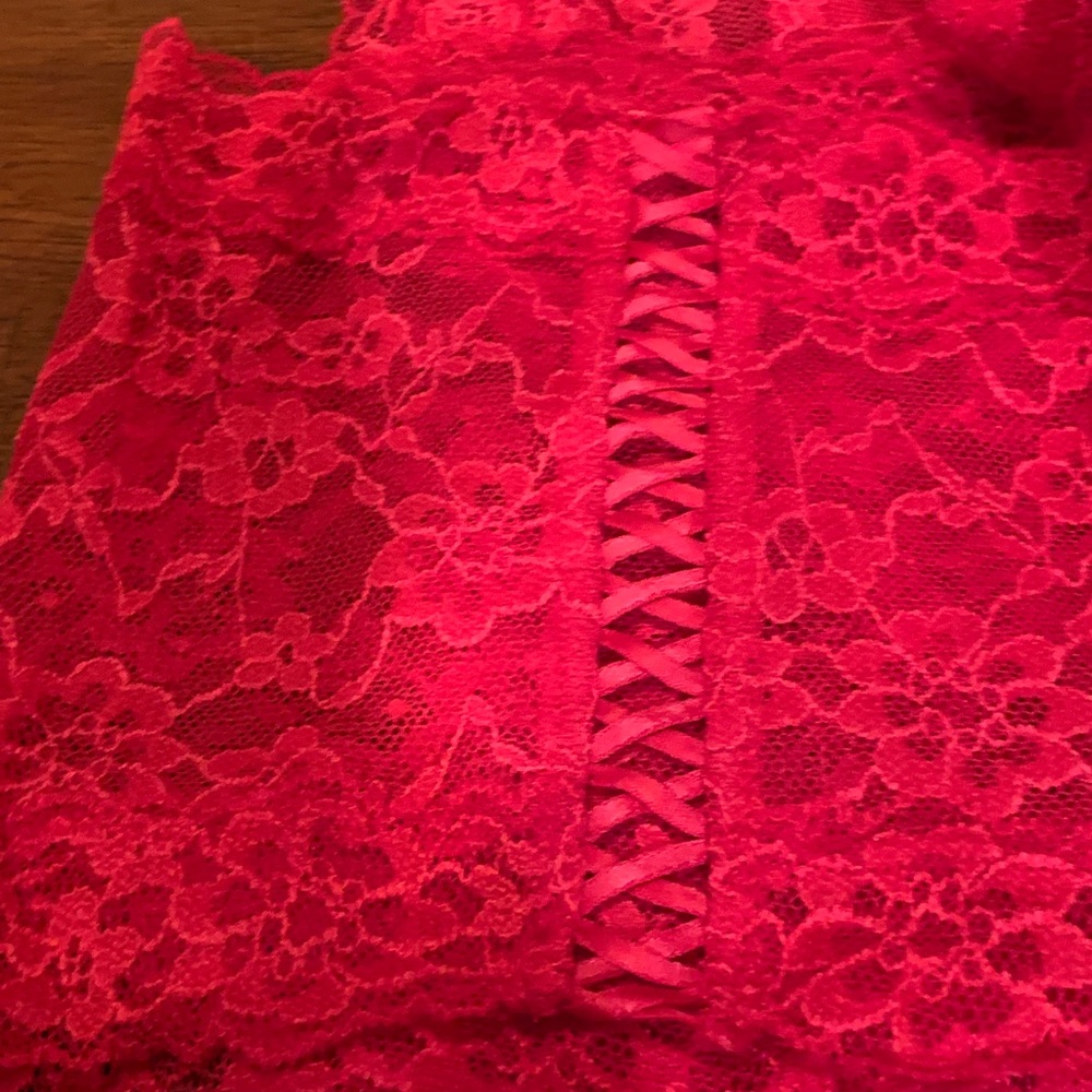 Absolutely stunning red lacy undies size XL, with beautiful  decor on the back